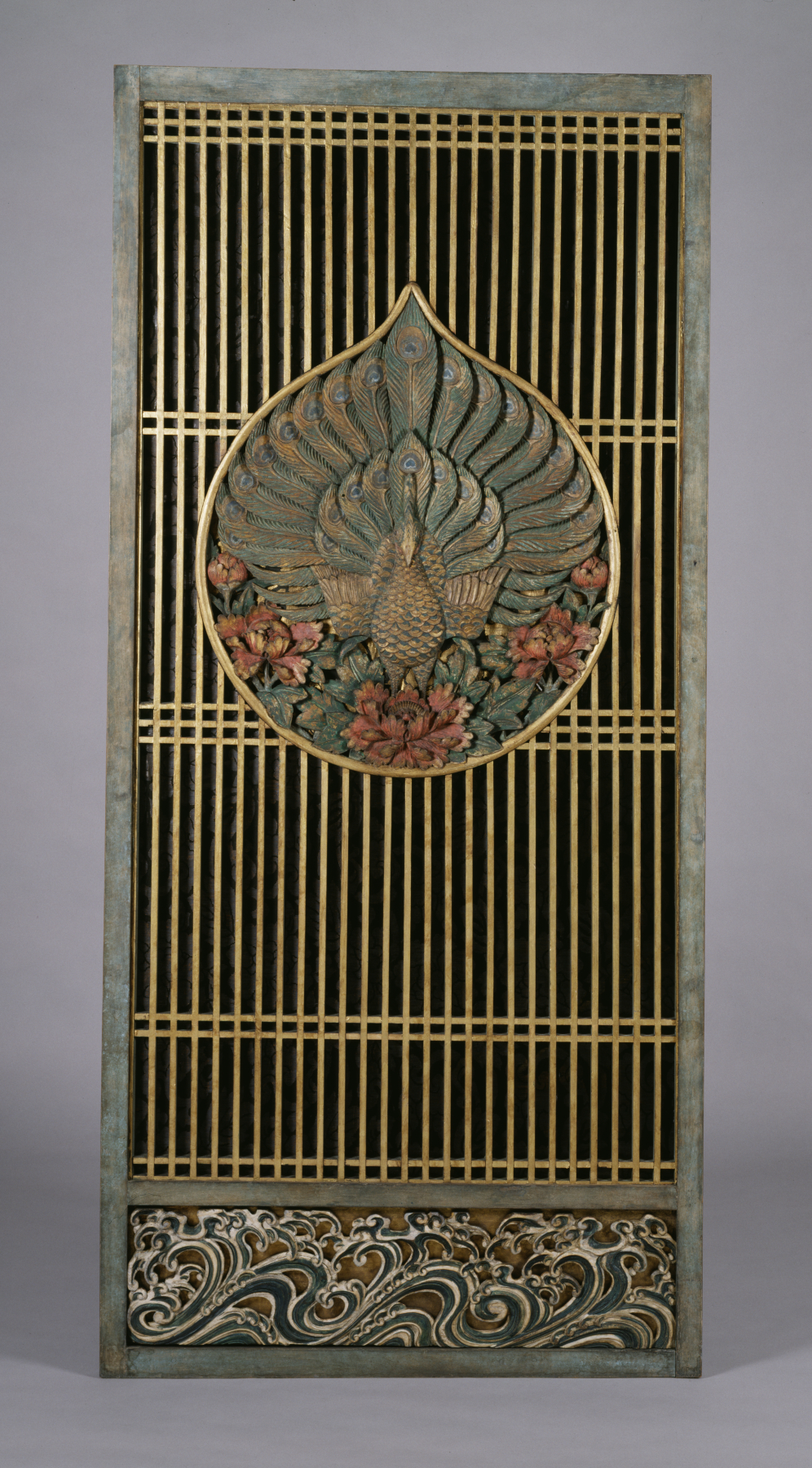 A closed decorated wooden doorway